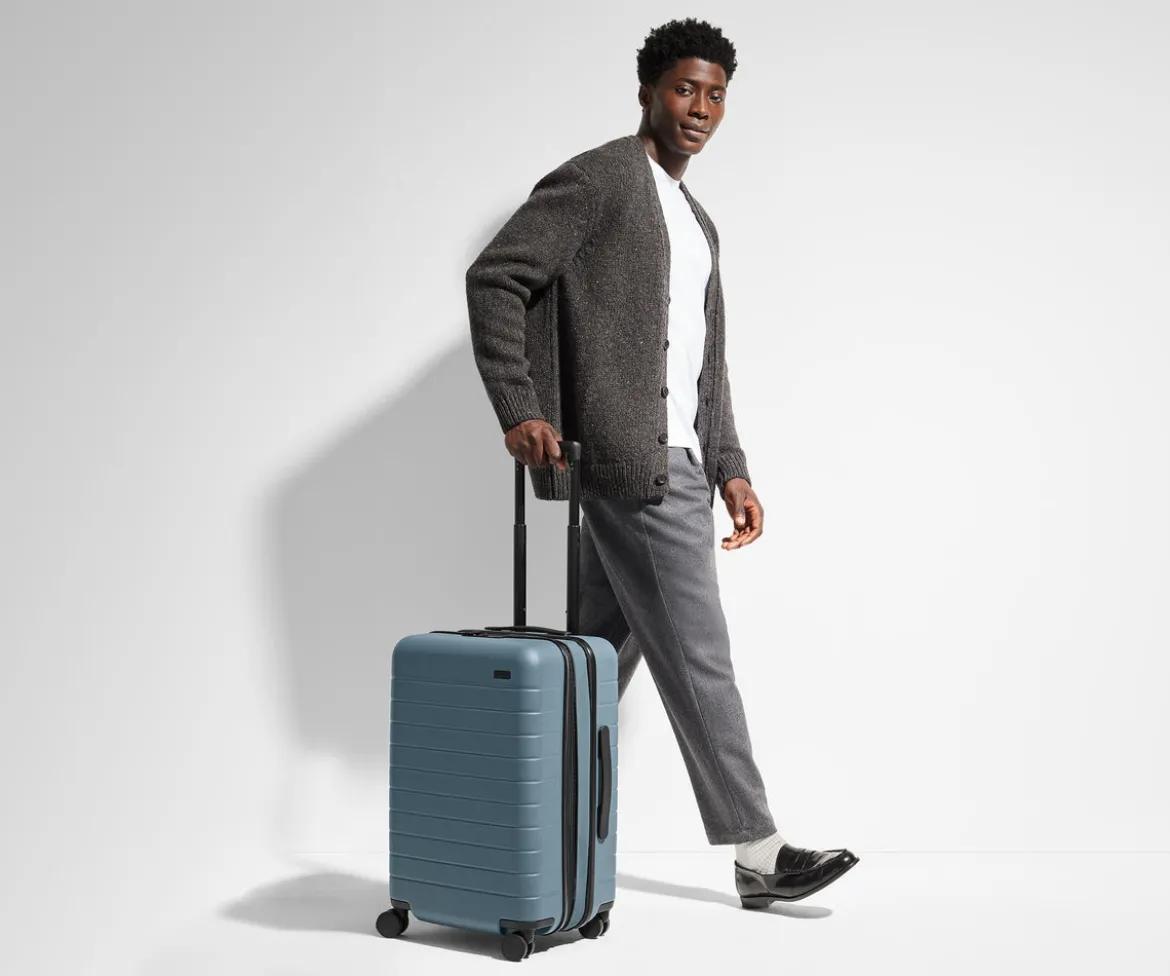 The Bigger Carry-On Flex in Navy Blue